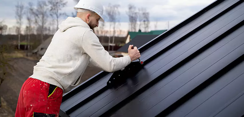 Tin Roof Ridge Cap Installation in Streamwood